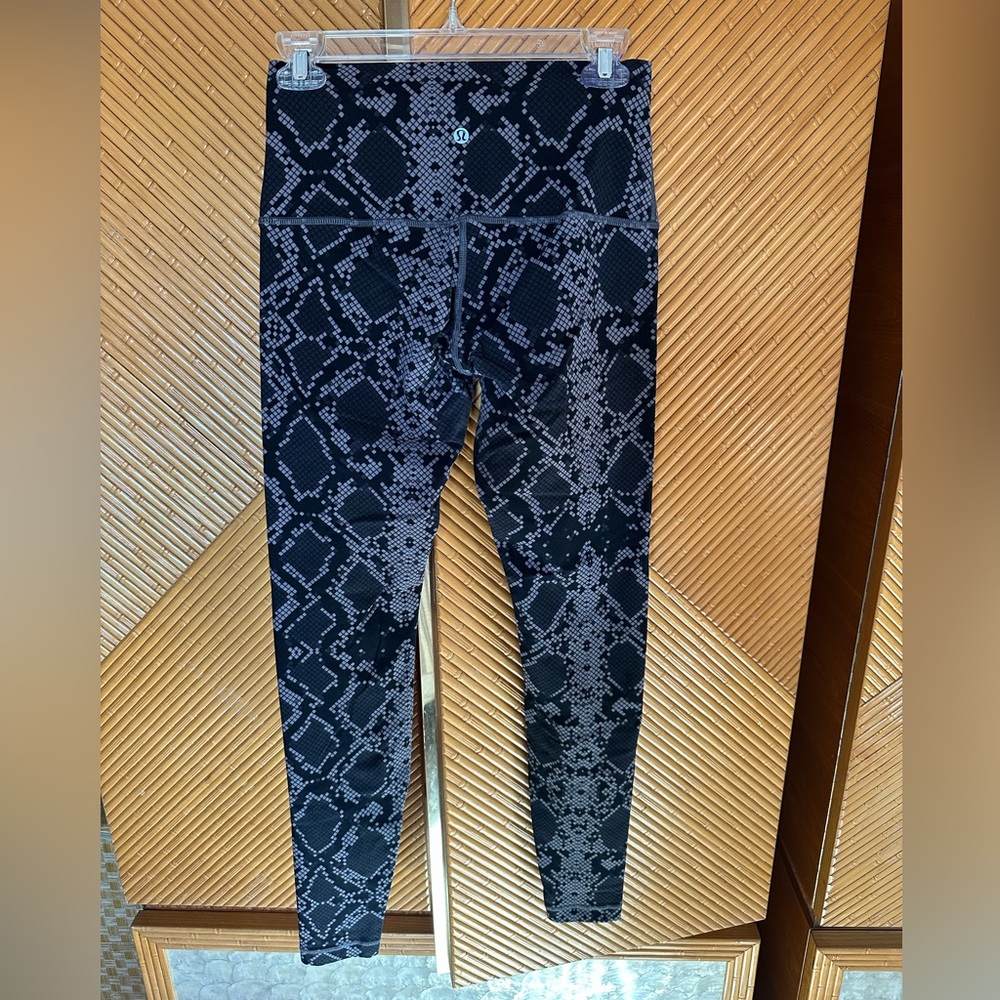 Lululemon Wunder Under High Waist Crop Leggings in a black and gray snake print